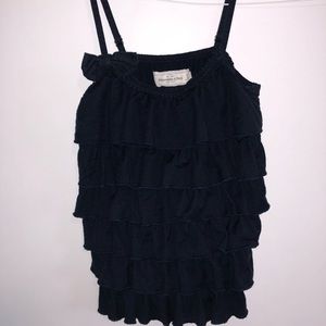 navy blue dressy ruffled tank with bow detail